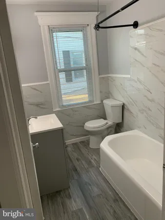 a bathroom with a sink and a bathtub