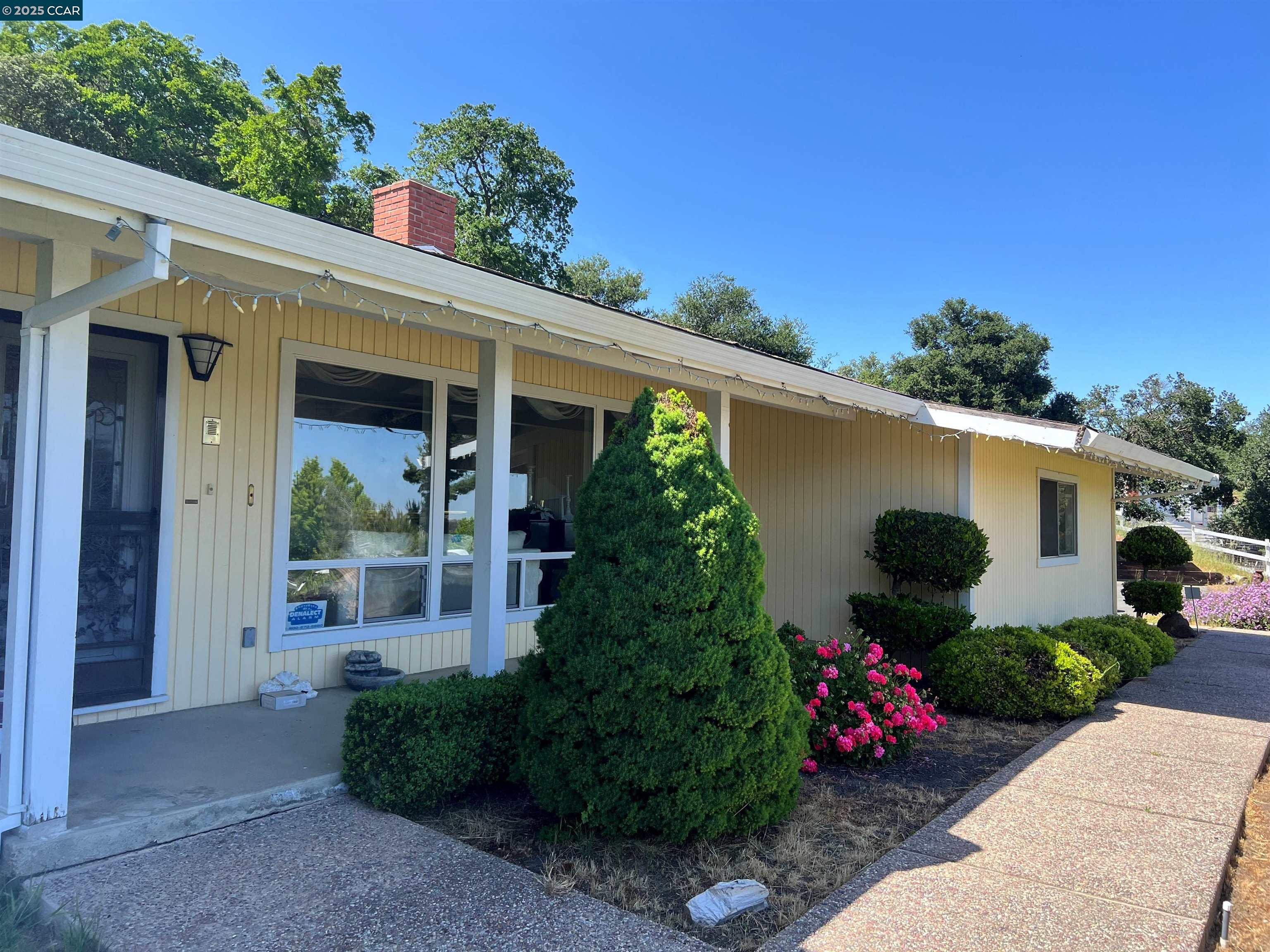 4983 Milden Road Martinez, CA 94553 - Photo 1 of 1 a view of a porch with garden