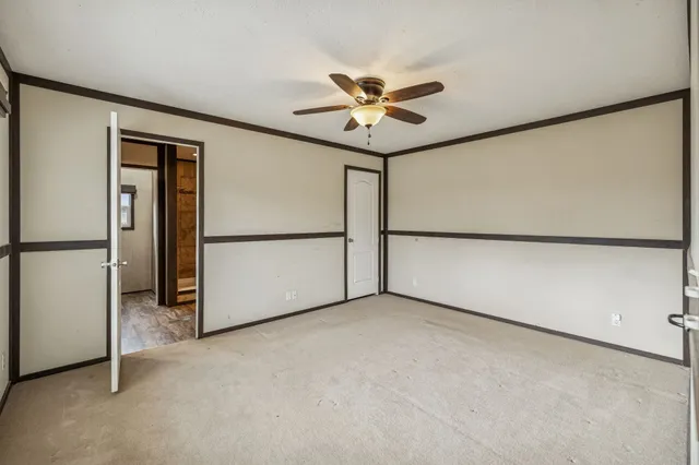 a view of a garage with a refrigerator