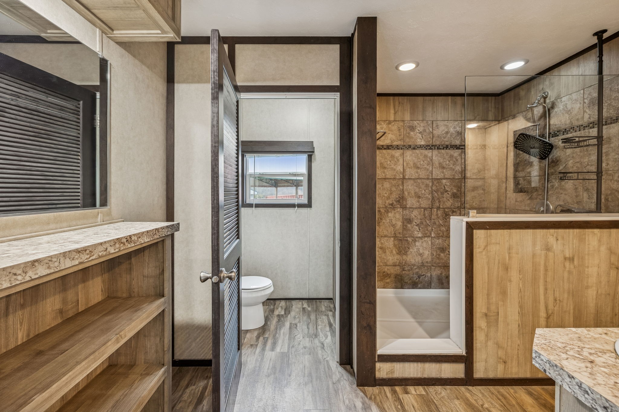 3118 McKibbon Road Culleoka, TN 38451 - Photo 15 of 31 a bathroom with a glass shower door and a sink