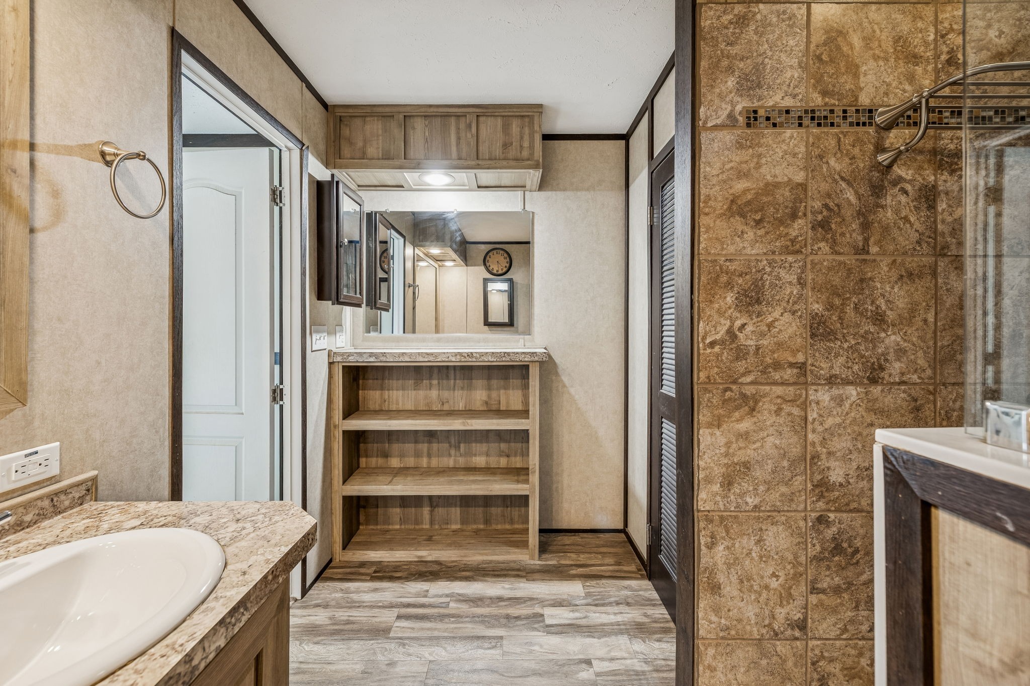3118 McKibbon Road Culleoka, TN 38451 - Photo 17 of 31 a bathroom with a granite countertop shower curtain and a sink