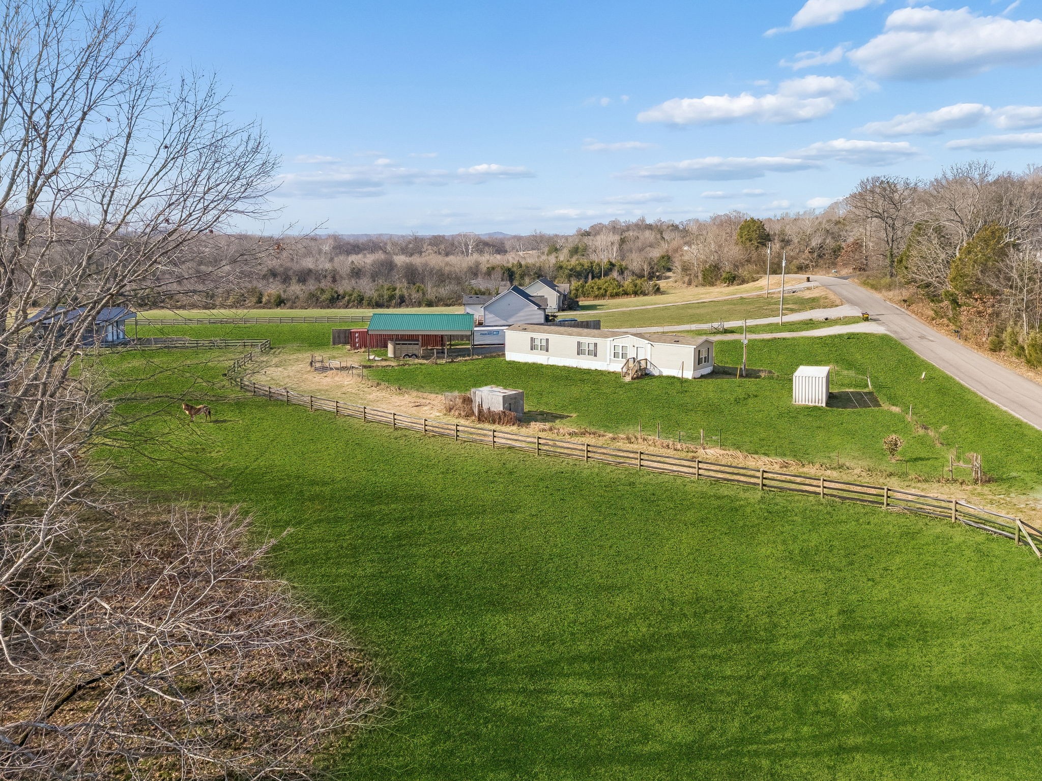 3118 McKibbon Road Culleoka, TN 38451 - Photo 2 of 31 a view of a lake with houses in the back