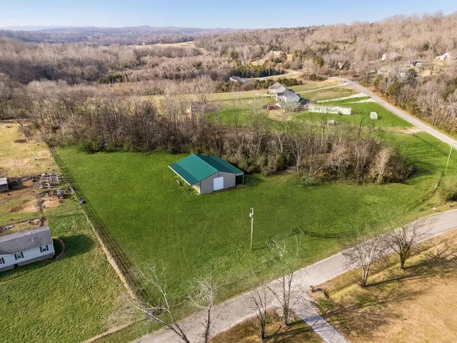 a view of a lake with a yard