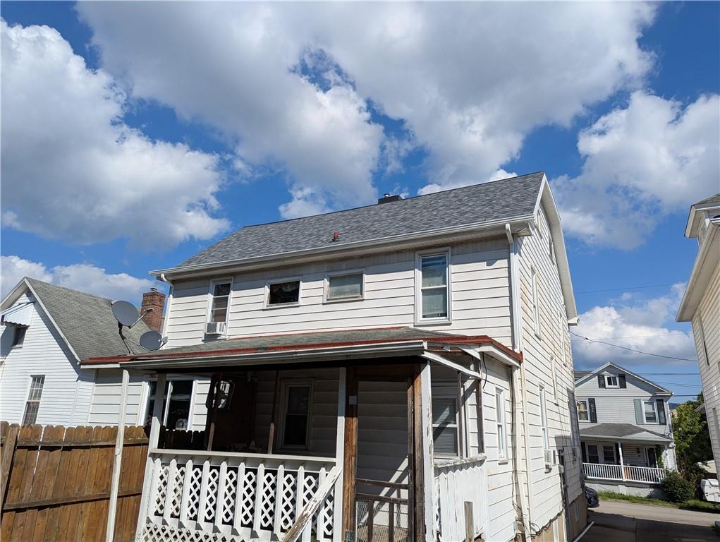 32-34 Lawton Avenue Uniontown, PA 15401 - Photo 2 of 23 a front view of a house with a balcony