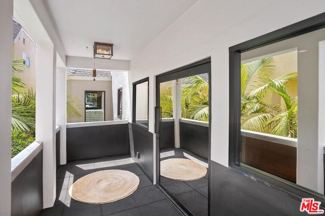 4811 Roma Court Marina del Rey, CA 90292 - Photo 27 of 57 a room with furniture and a large window