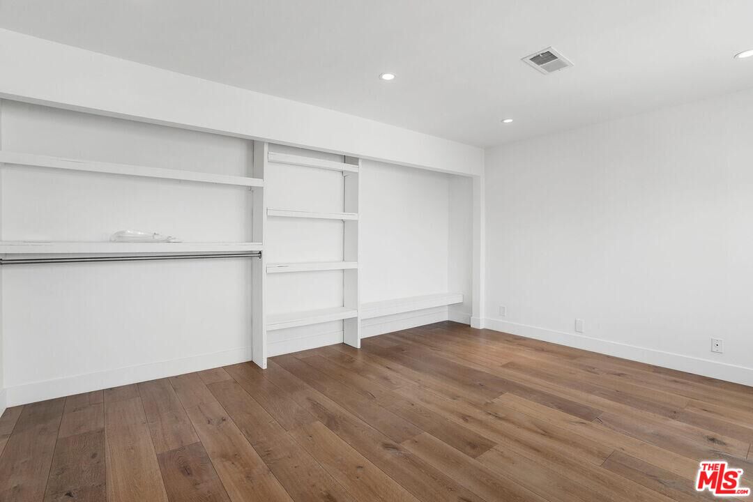 4811 Roma Court Marina del Rey, CA 90292 - Photo 44 of 57 a view of empty room with wooden floor