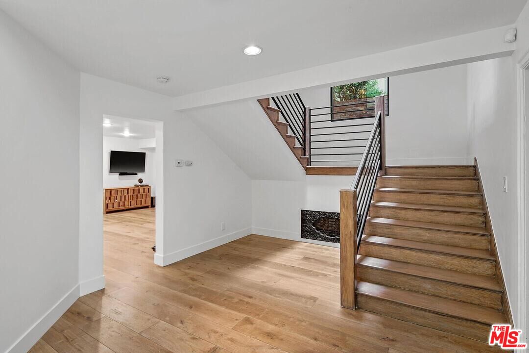 4811 Roma Court Marina del Rey, CA 90292 - Photo 10 of 57 a view of entryway and hall with wooden floor