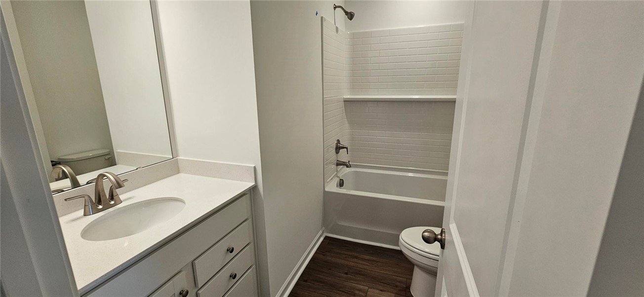 409 Belgrove Way Easley, SC 29640 - Photo 13 of 15 This bathroom features elegant finishes and a classic shower and tub combination.