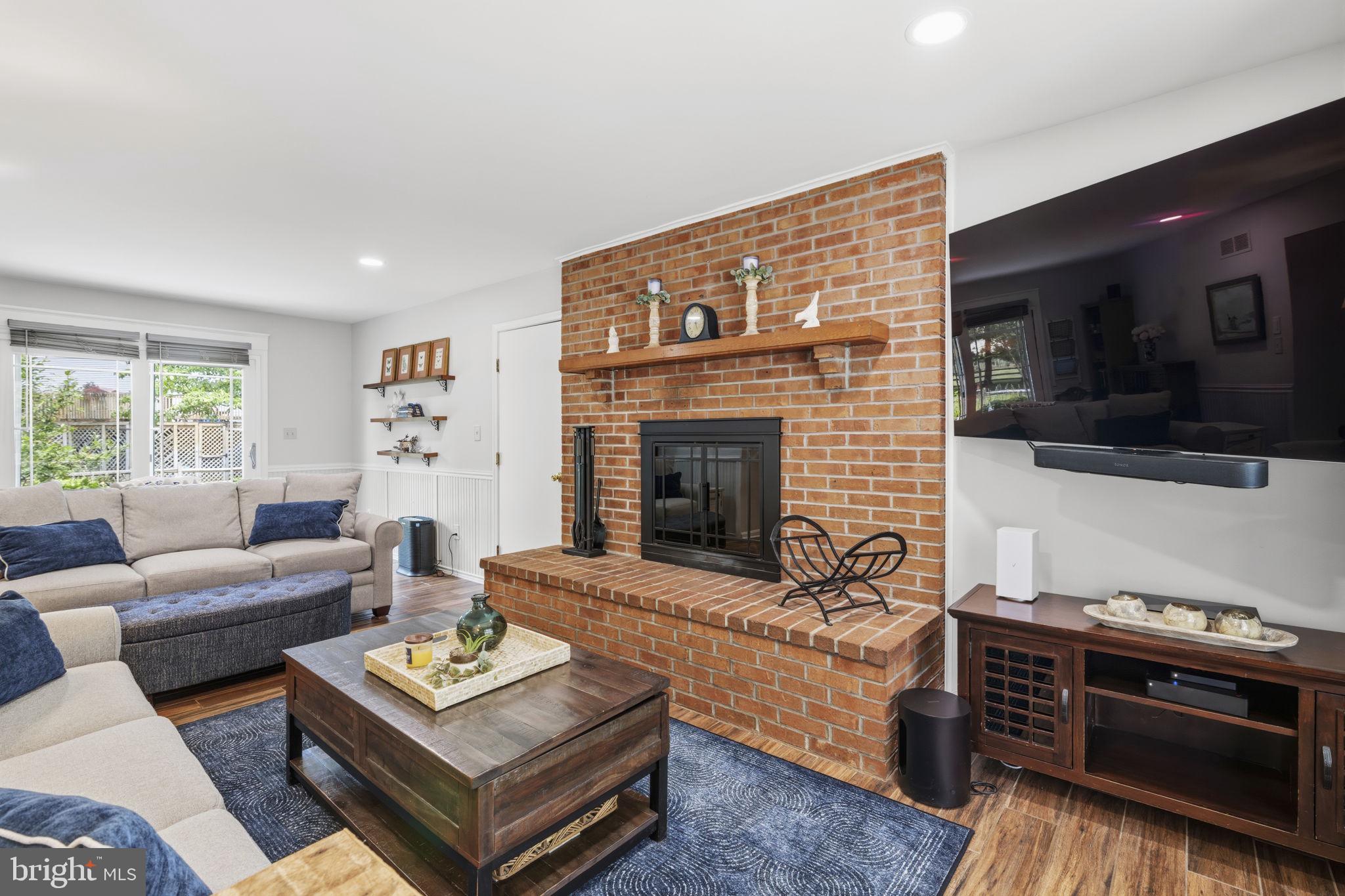 502 North Shamrock Road Bel Air, MD 21014 - Photo 15 of 46 Wood burning fireplace w/accent brick wall