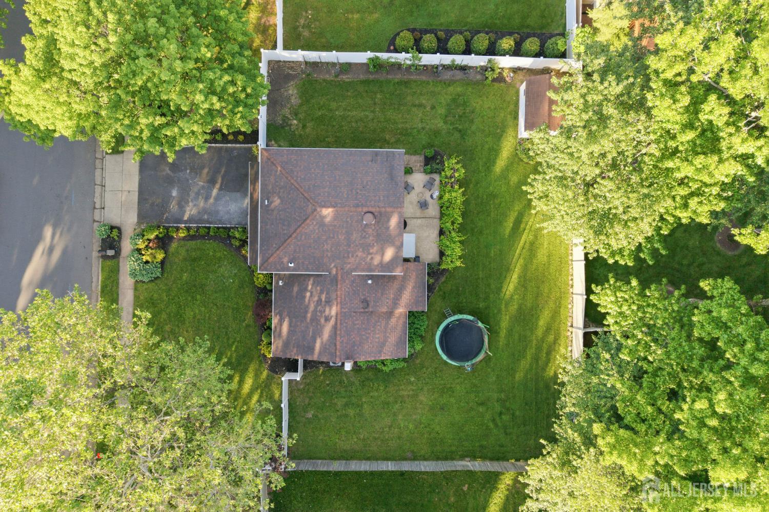 5 McKinley Street Edison, NJ 08820 - Photo 37 of 38 an aerial view of a house with a yard
