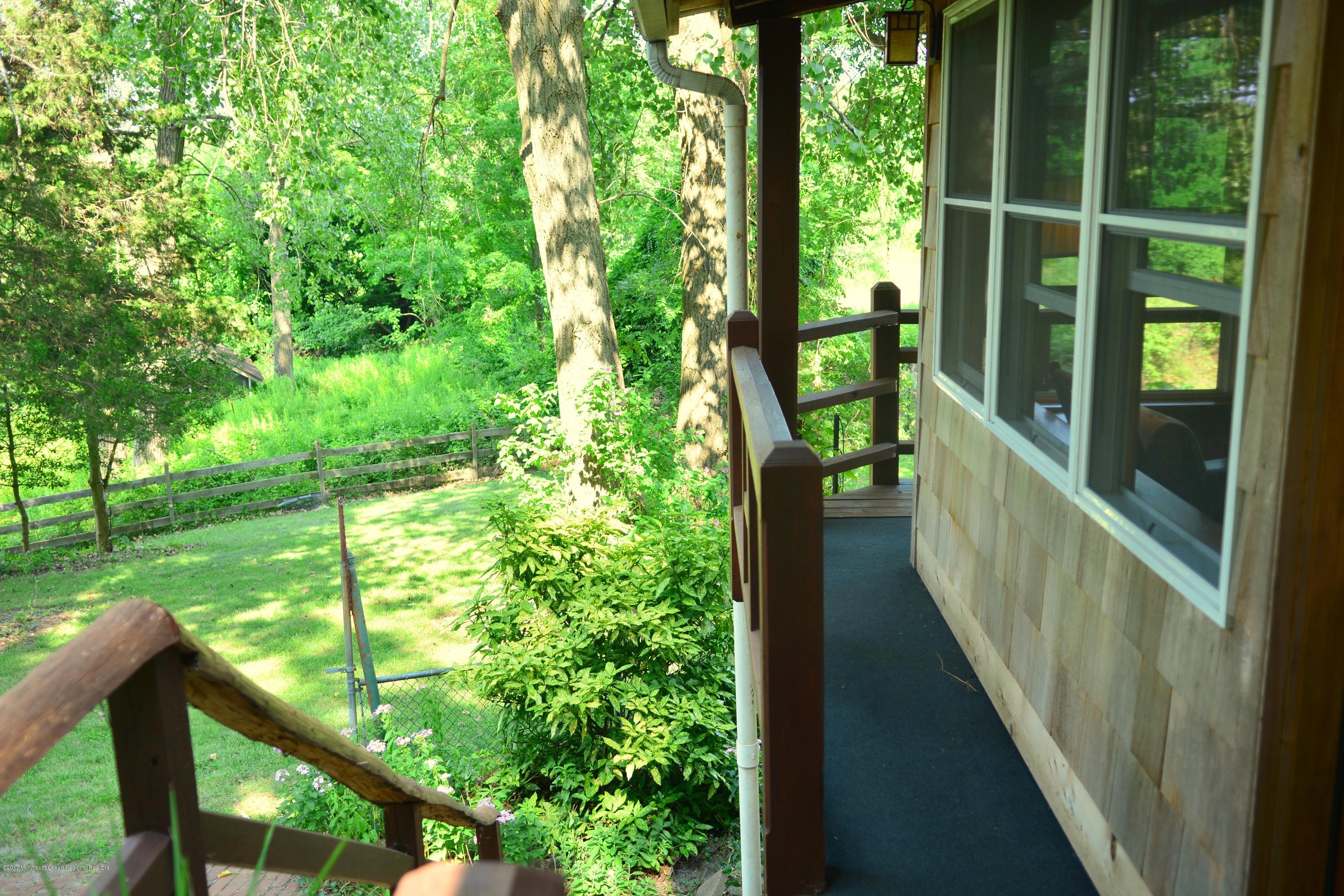 744 Wayside Road Neptune Township, NJ 07753 - Photo 16 of 23 WRAPAROUND PORCH