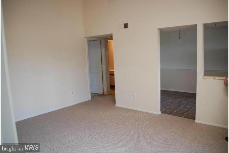 119 Fort Evans Road Southeast, Unit E Leesburg, VA 20175 - Photo 5 of 29 a view of an empty room