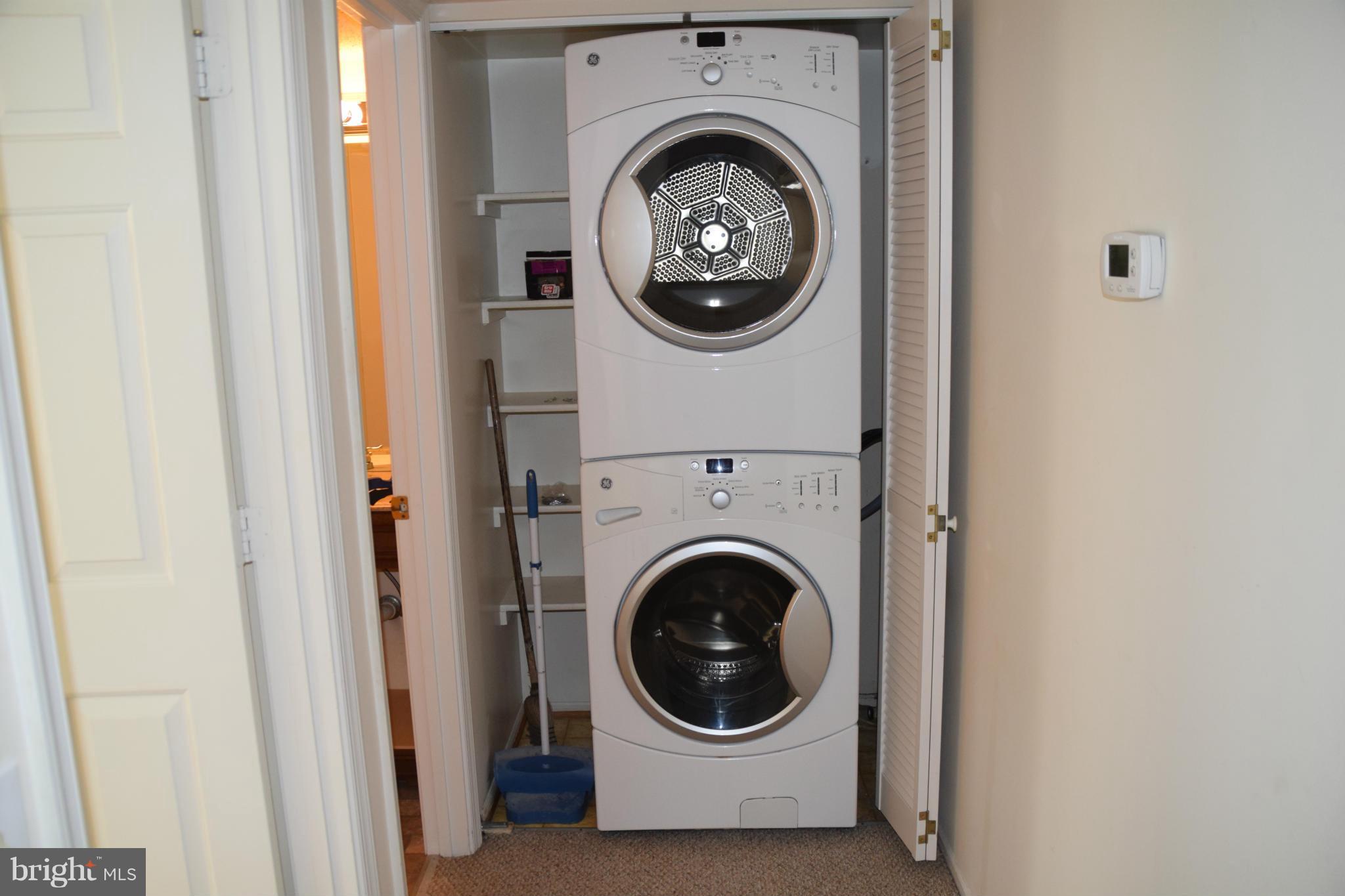119 Fort Evans Road Southeast, Unit E Leesburg, VA 20175 - Photo 6 of 29 a view of entryway with washer and dryer
