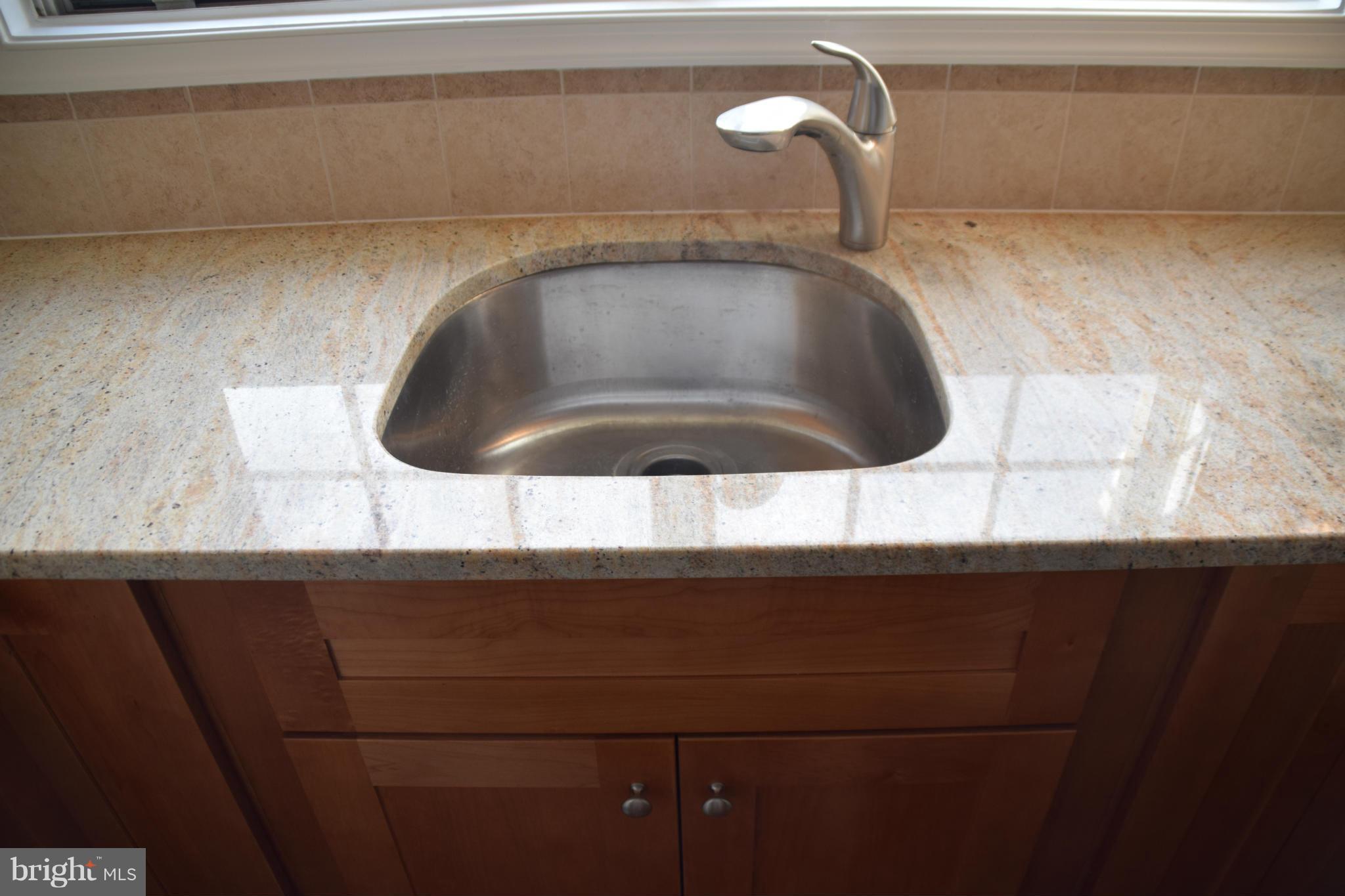 119 Fort Evans Road Southeast, Unit E Leesburg, VA 20175 - Photo 10 of 29 a close view of sink