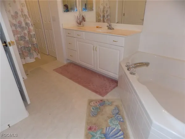 a view of a chairs and table in the balcony