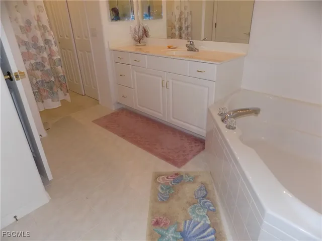 a view of a chairs and table in the balcony