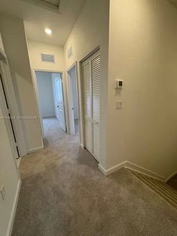 an empty room with a natural light