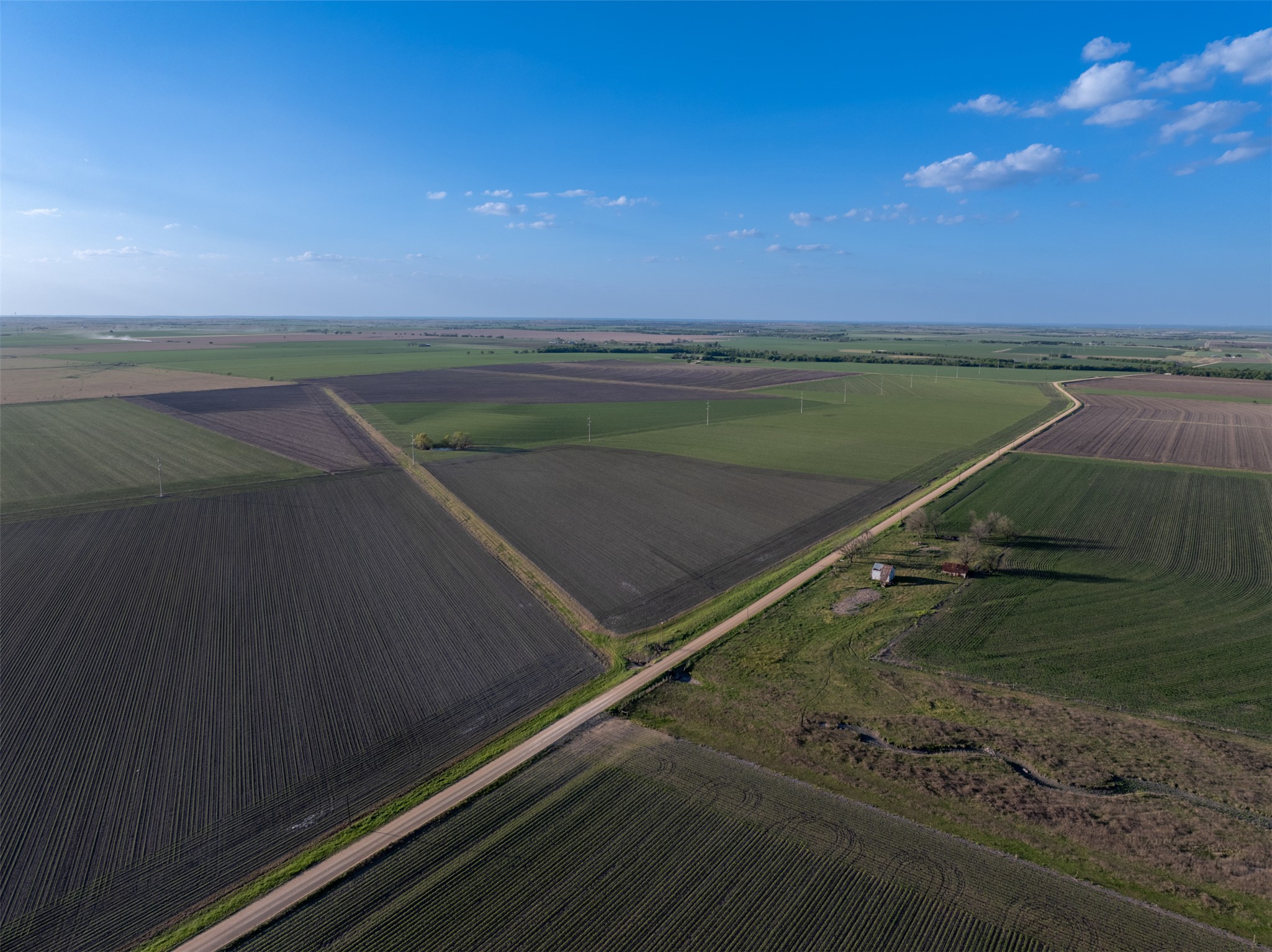 0 Romberg Road Bartlett, TX 76511 - Photo 3 of 15 Aerial view of sparsely populated area with rows of crops