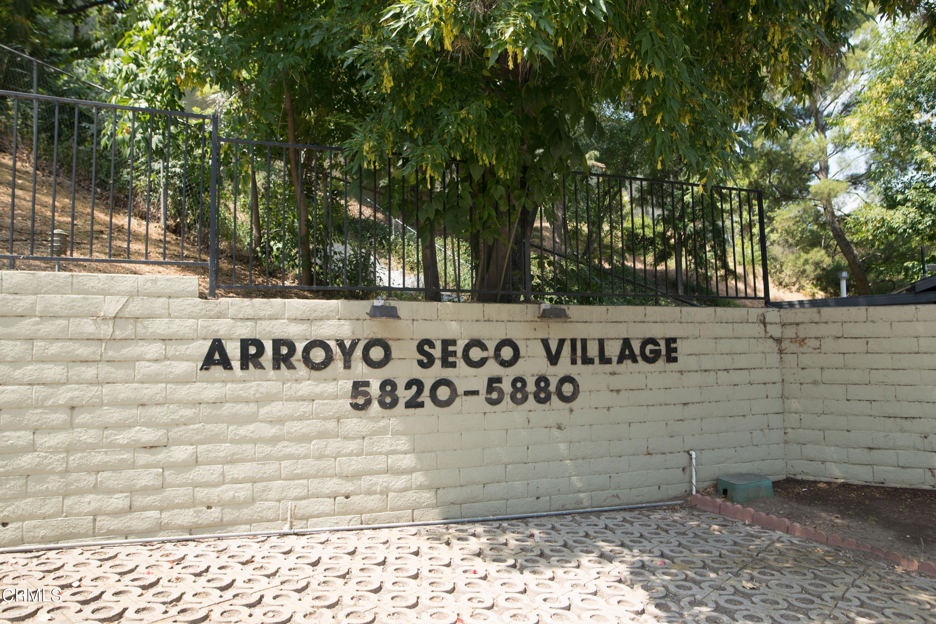 5850 Benner Street, Unit 306 Los Angeles, CA 90042 - Photo 28 of 29 a sign that is on the side of a building