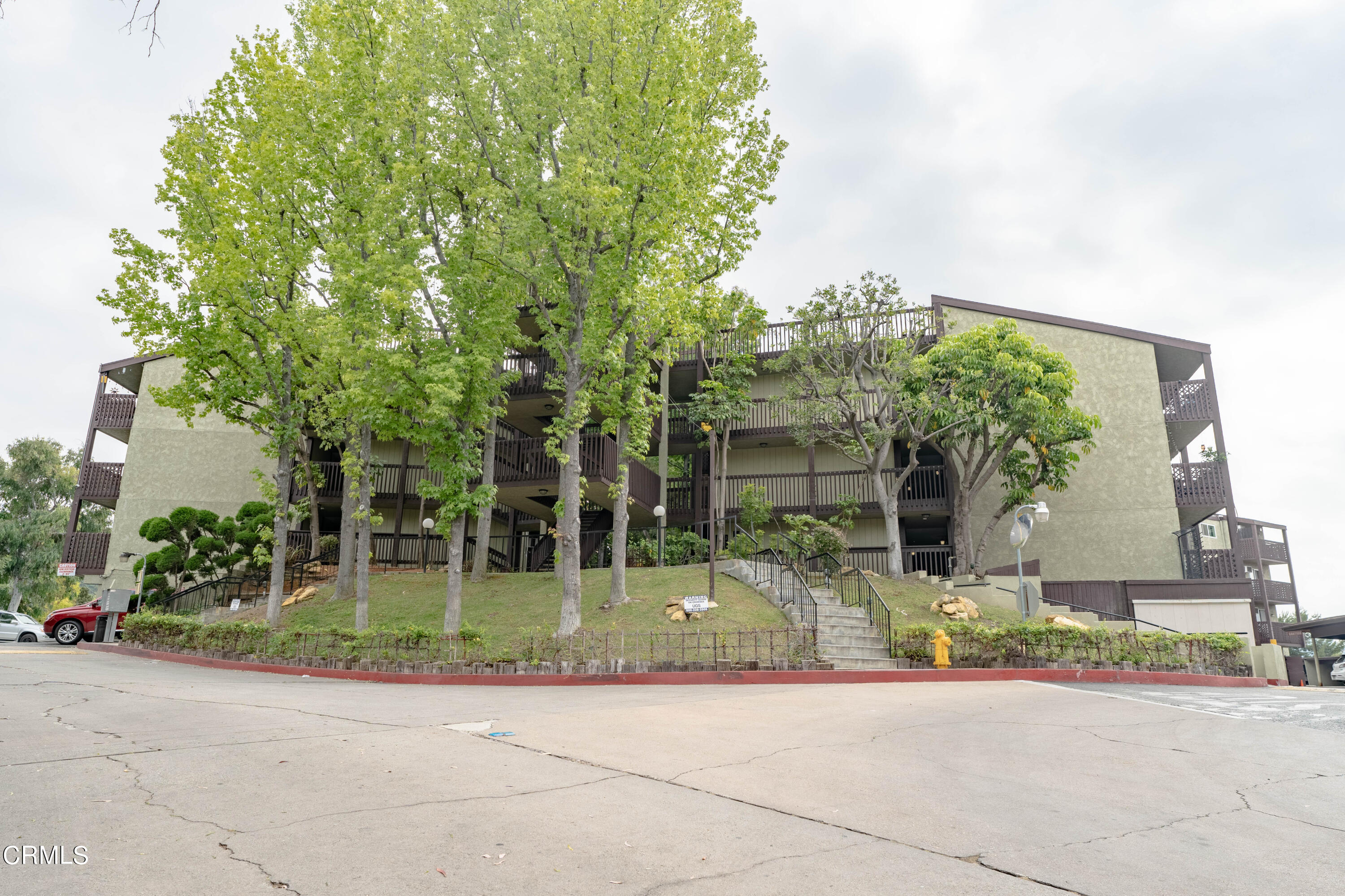 5850 Benner Street, Unit 306 Los Angeles, CA 90042 - Photo 29 of 29 front view of a house with a yard