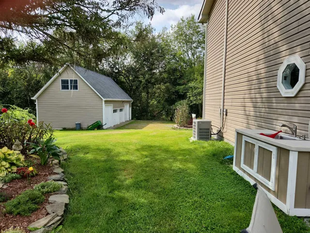 a house view with a garden space