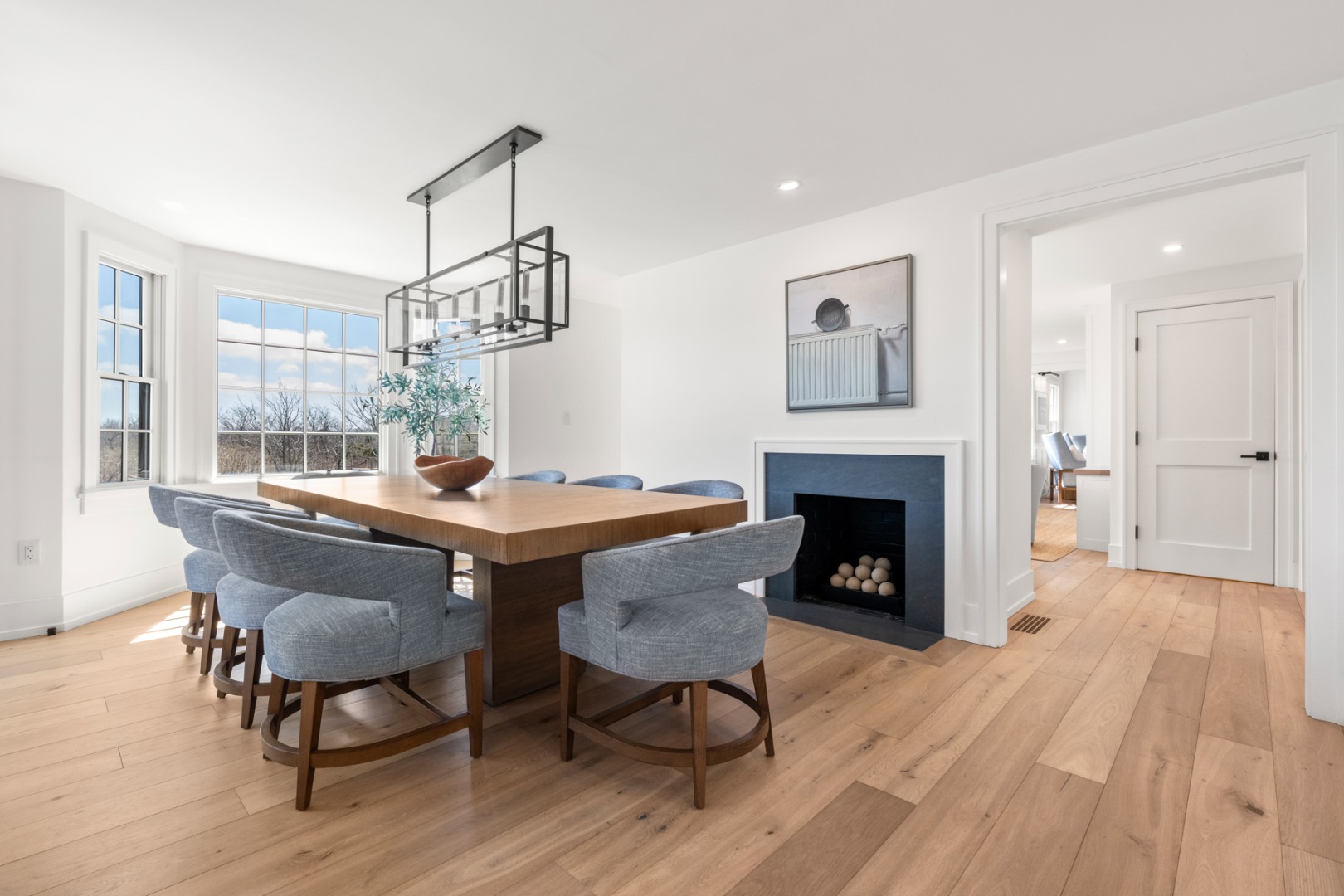 174 Cliff Road Nantucket, MA 02554 - Photo 11 of 49 a view of a dining room with furniture window and wooden floor
