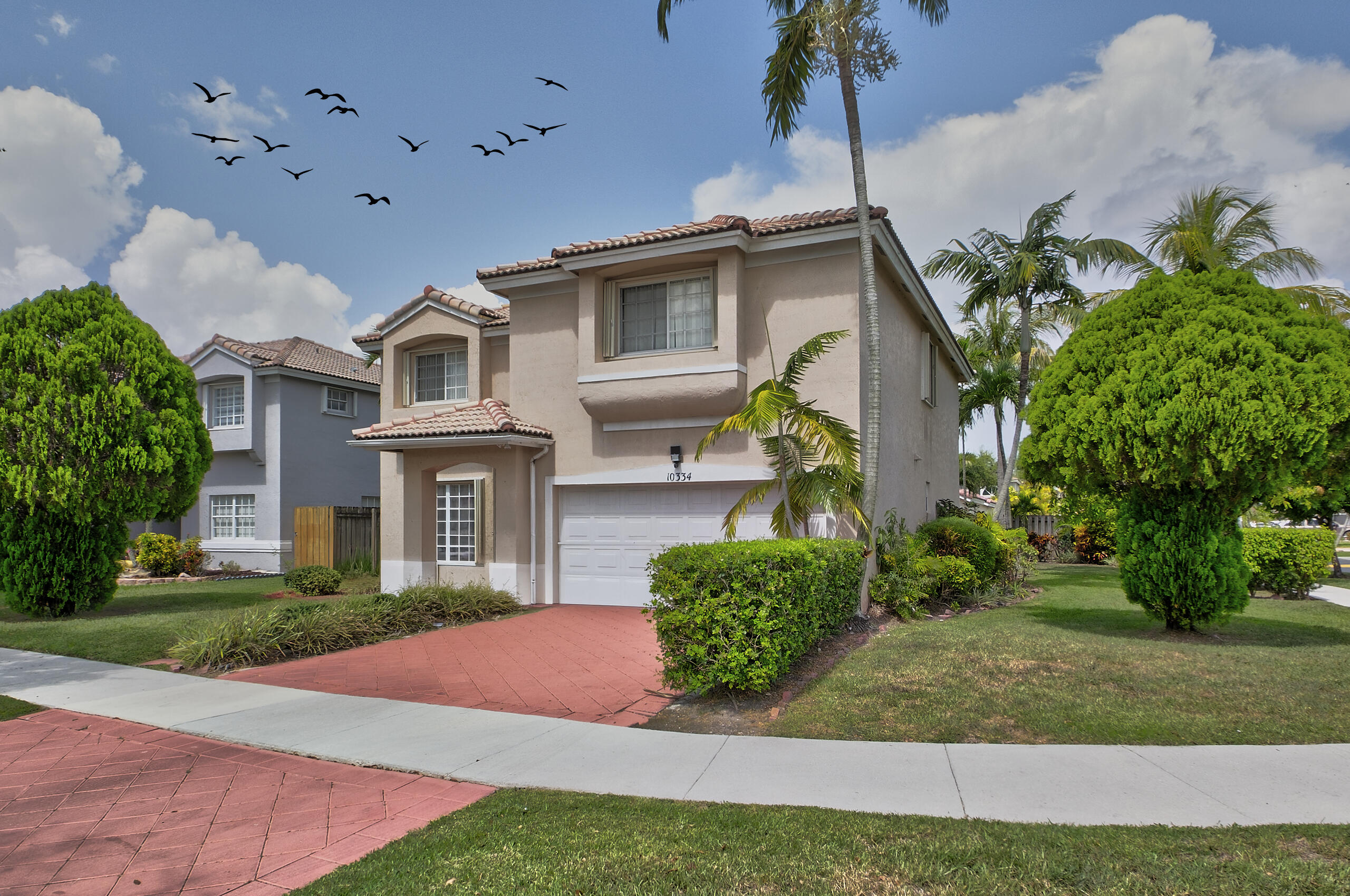 10334 Southwest 164th Place Miami, FL 33196 - Photo 1 of 41 R_F049