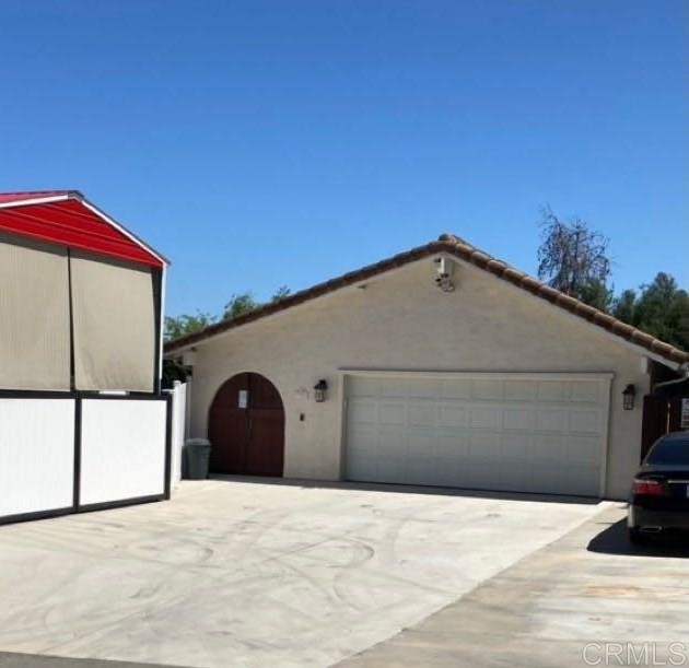 731 West Winterhaven Road Fallbrook, CA 92028 - Photo 1 of 1 Front of Home Showing lots of parking, garage, RV Barn and Custom Private Entrance