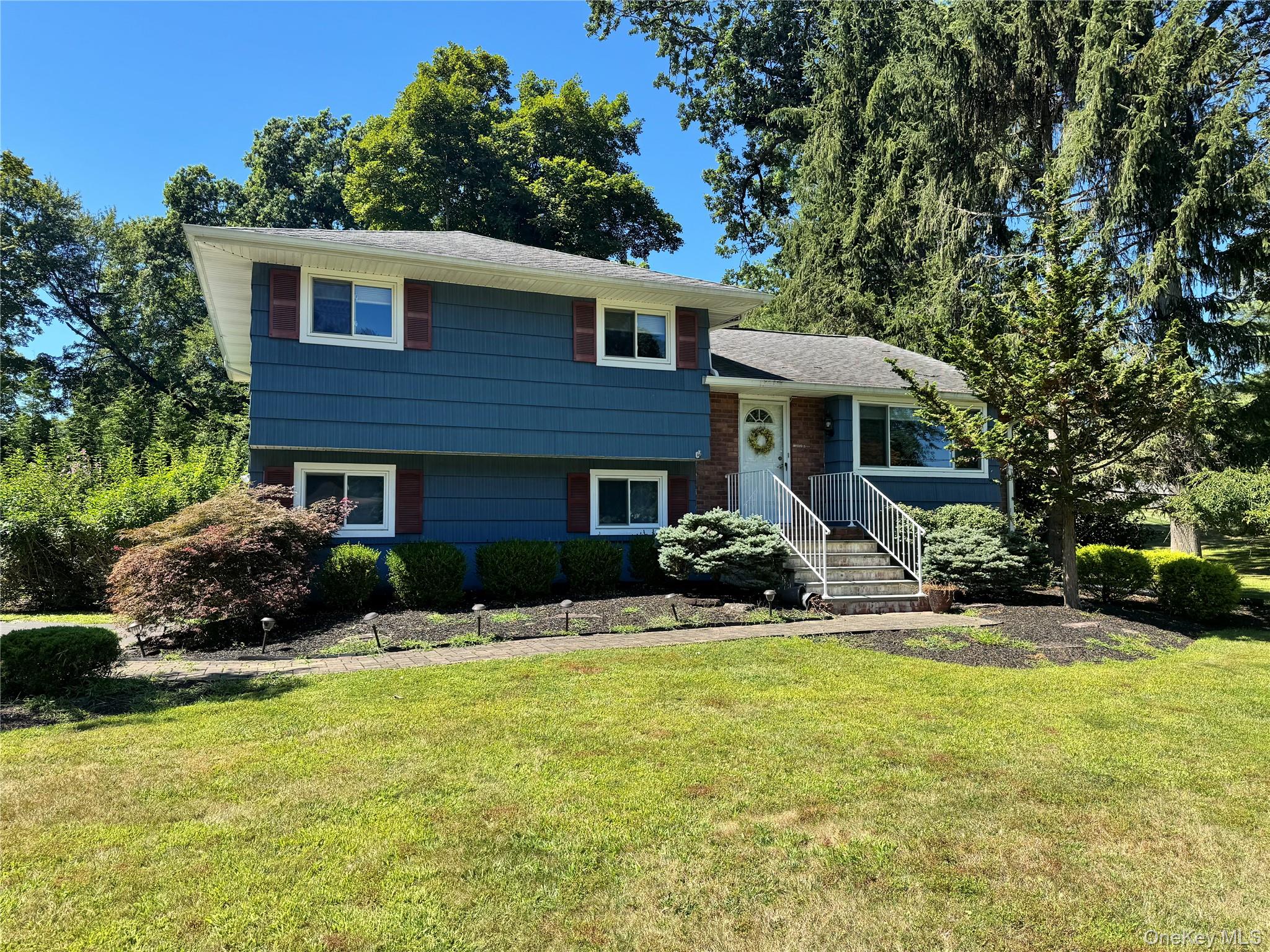 20 Mark Lane New City, NY 10956 - Photo 1 of 1 a front view of house with yard and green space
