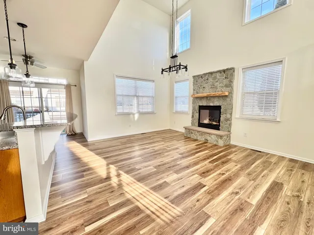 a bedroom with a bed and a fireplace