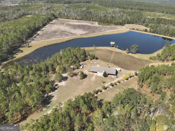 a view of a lake with a yard
