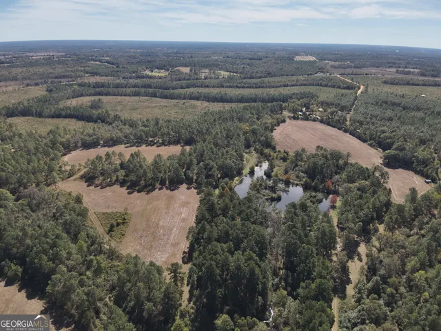 a view of a lake with mountain