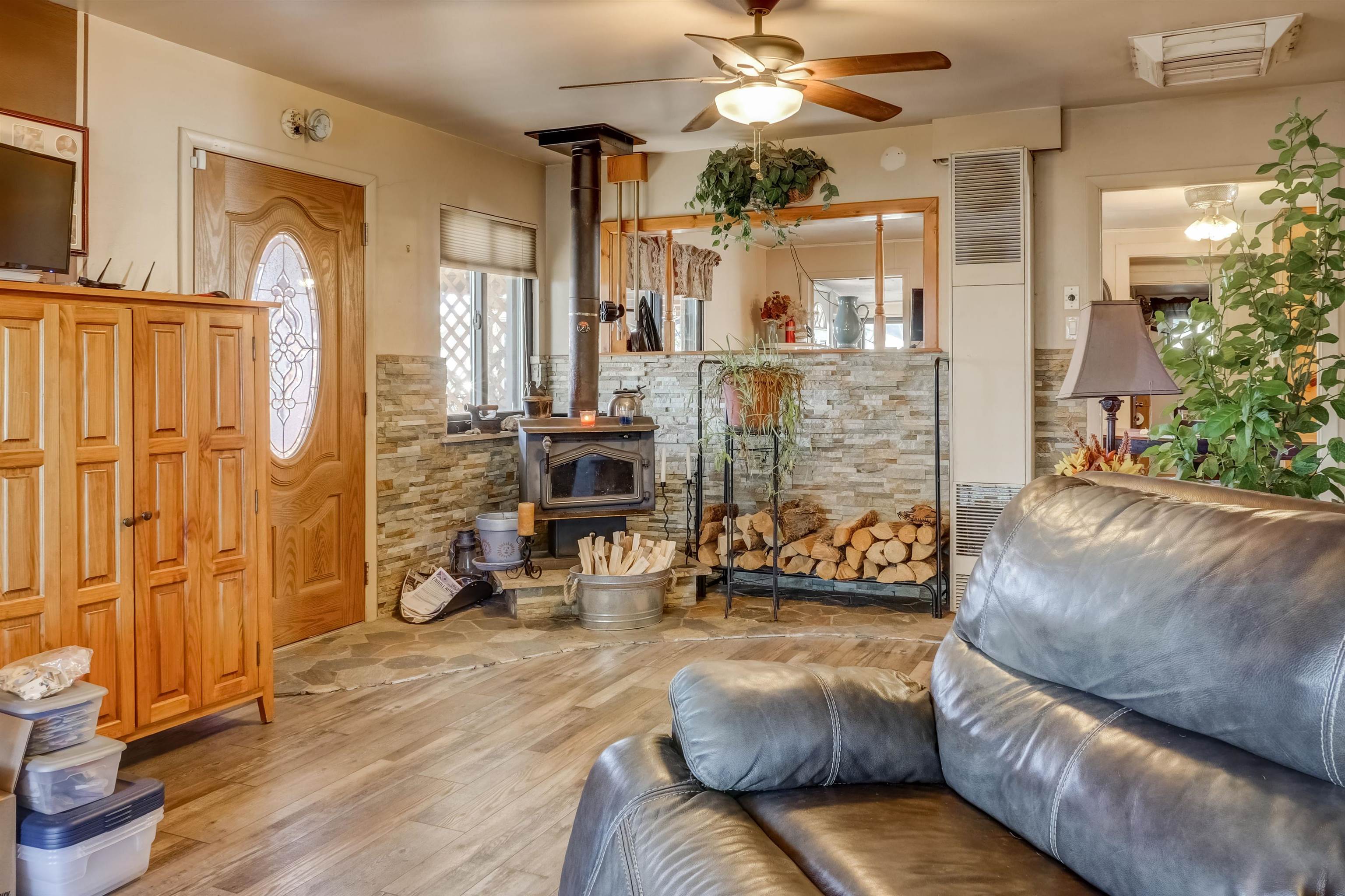 413 31 Road Grand Junction, CO 81504 - Photo 4 of 10 a living room with furniture and a fireplace