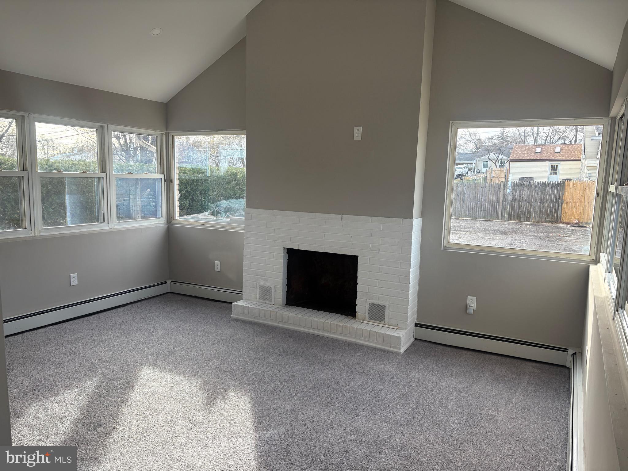 932 Rozel Avenue Southampton, PA 18966 - Photo 15 of 32 an empty room with windows and fireplace