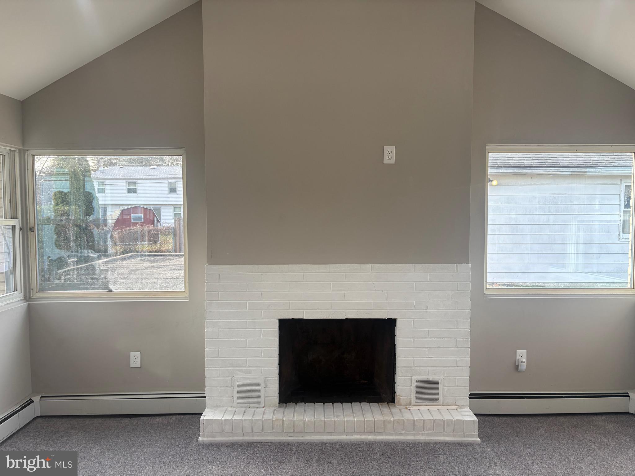 932 Rozel Avenue Southampton, PA 18966 - Photo 16 of 32 a living room with a fireplace and a window