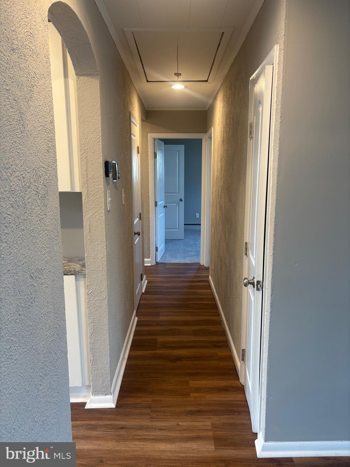 932 Rozel Avenue Southampton, PA 18966 - Photo 20 of 32 a view of a hallway with wooden floor and staircase