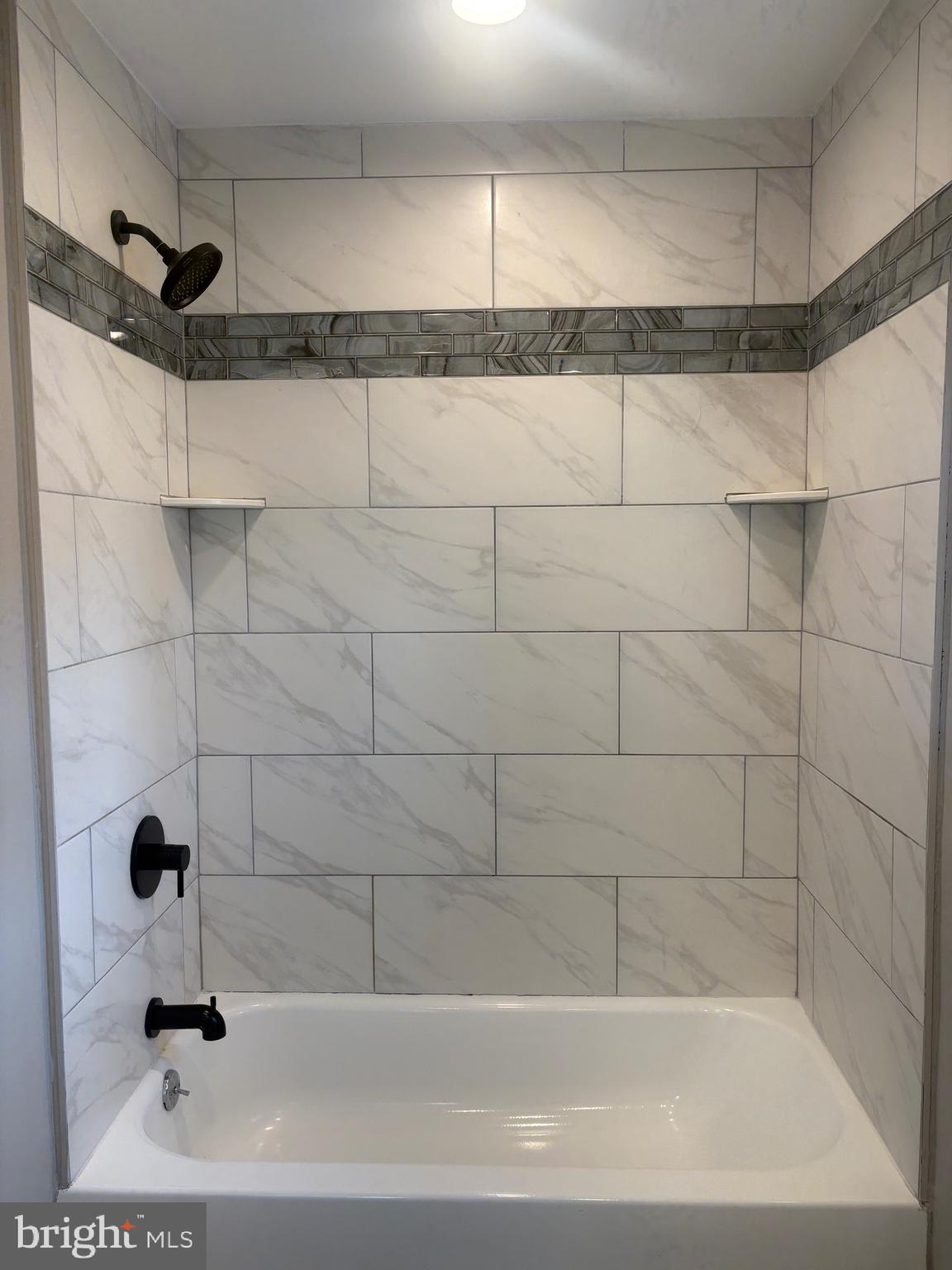 932 Rozel Avenue Southampton, PA 18966 - Photo 28 of 32 a bathroom with a bathtub and a shower