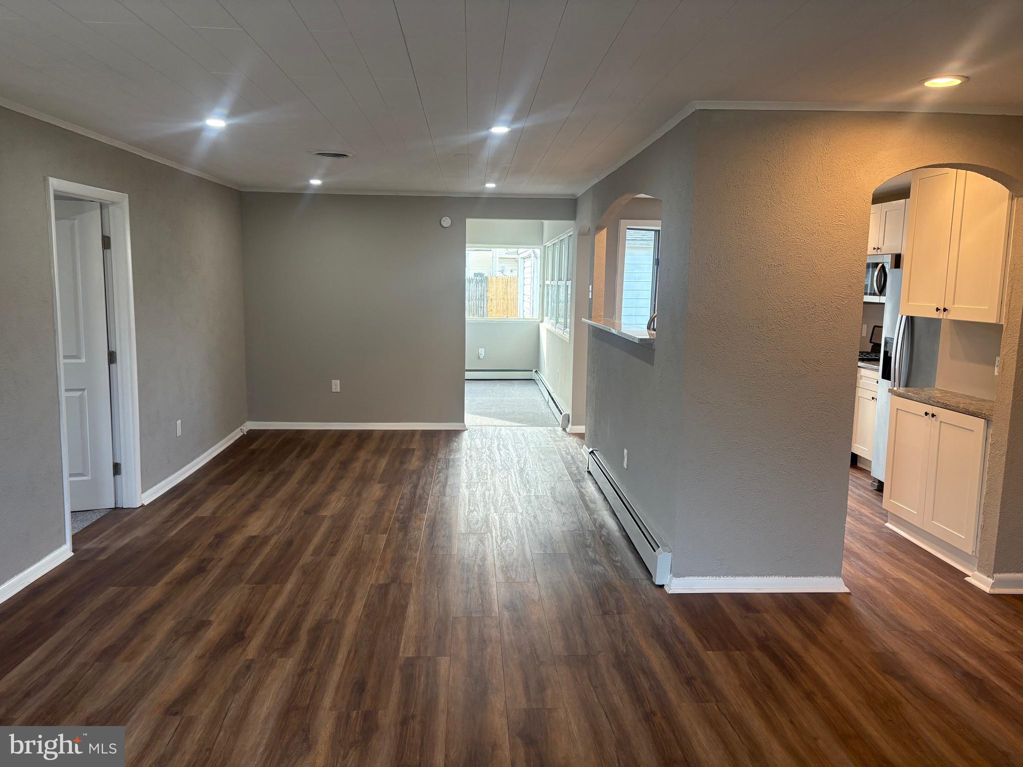 932 Rozel Avenue Southampton, PA 18966 - Photo 9 of 32 wooden floor in an empty room with a window