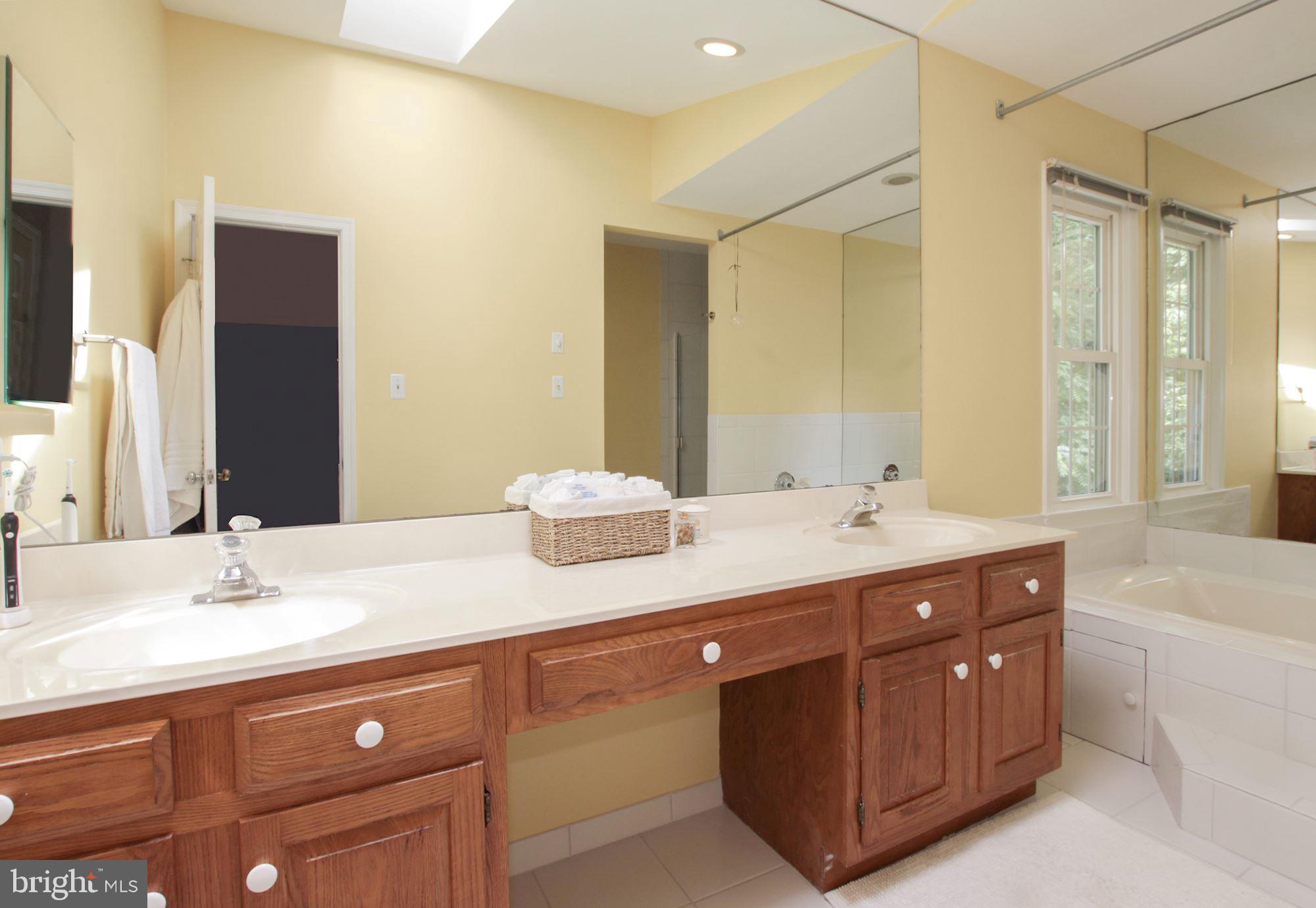 15309 Watergate Road Silver Spring, MD 20905 - Photo 21 of 43 Primary bathroom with dual sinks