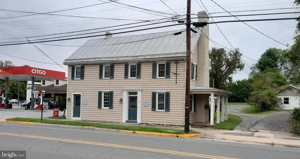 a view of a building with a street