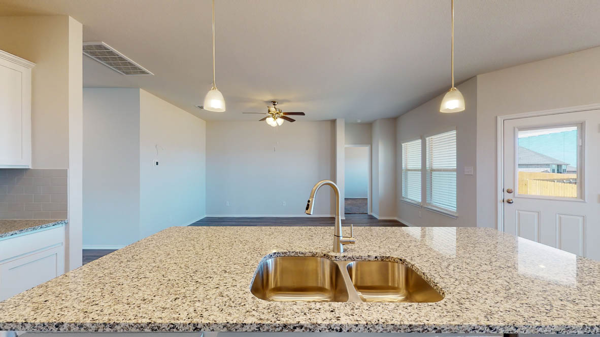 246 Water Wl Road Burnet, TX 78611 - Photo 4 of 16 a close view of a sink a counter space and a wooden floor