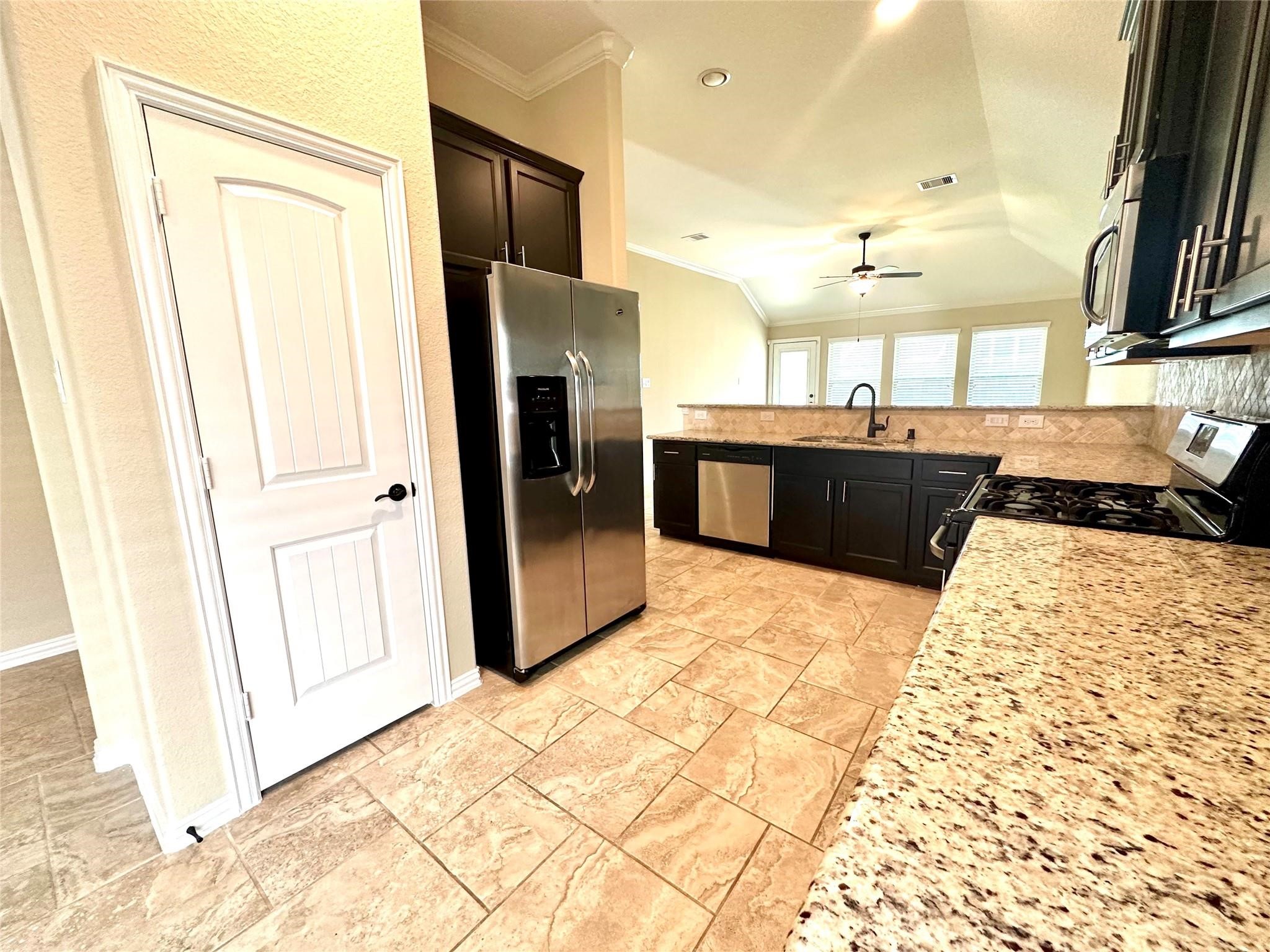 14818 Raleigh's Meadow Court Cypress, TX 77433 - Photo 3 of 17 a large bathroom with a tub and shower
