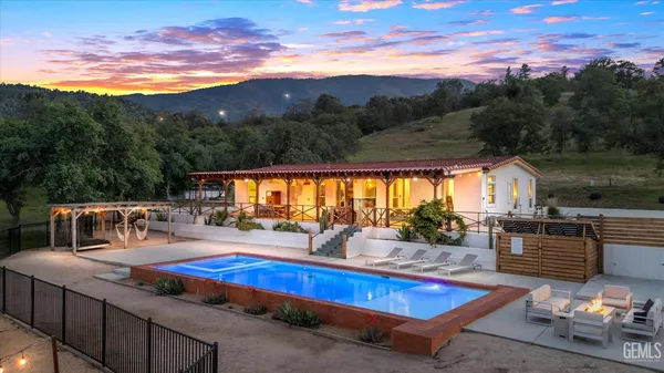 a view of a chairs and table on the terrace