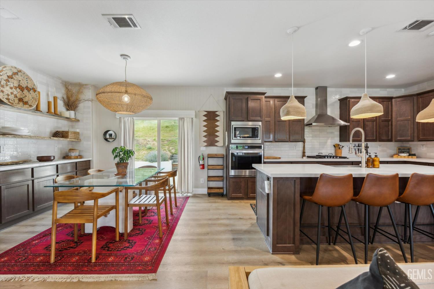 Undisclosed Address Keene, CA 93531 - Photo 22 of 60 a large kitchen with a table and chairs