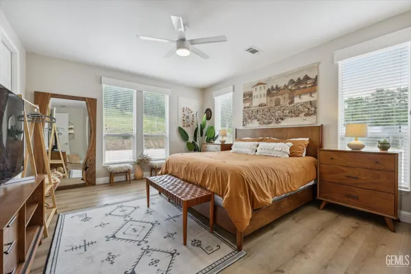 a bathroom with a bathtub and shower