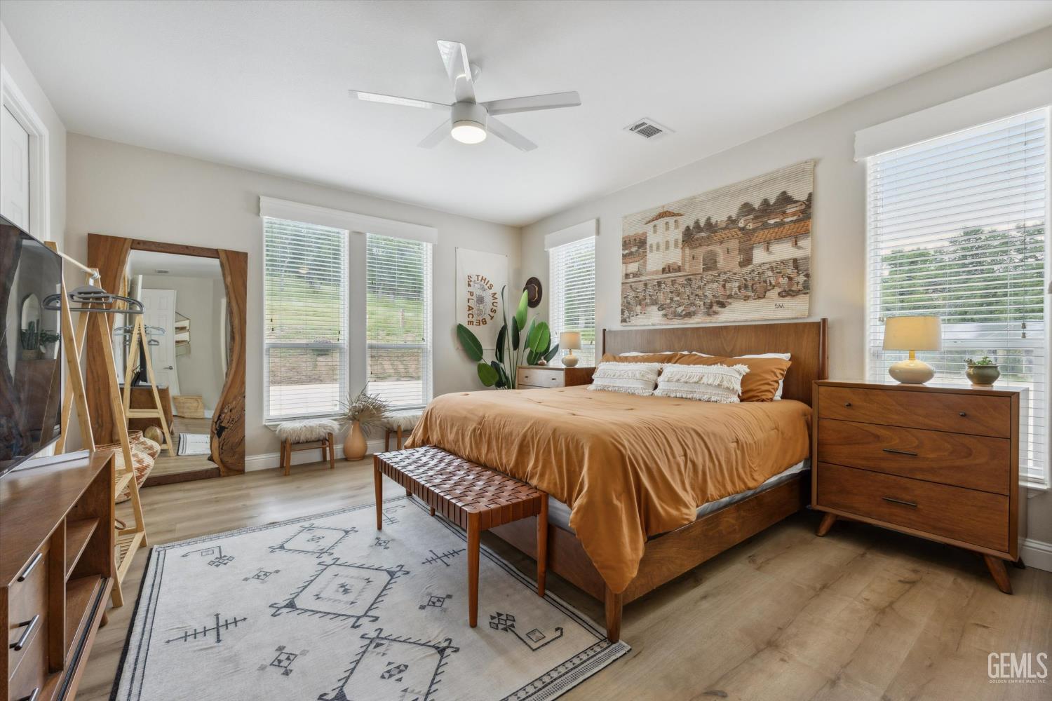 Undisclosed Address Keene, CA 93531 - Photo 25 of 60 a spacious bedroom with a bed and a large window