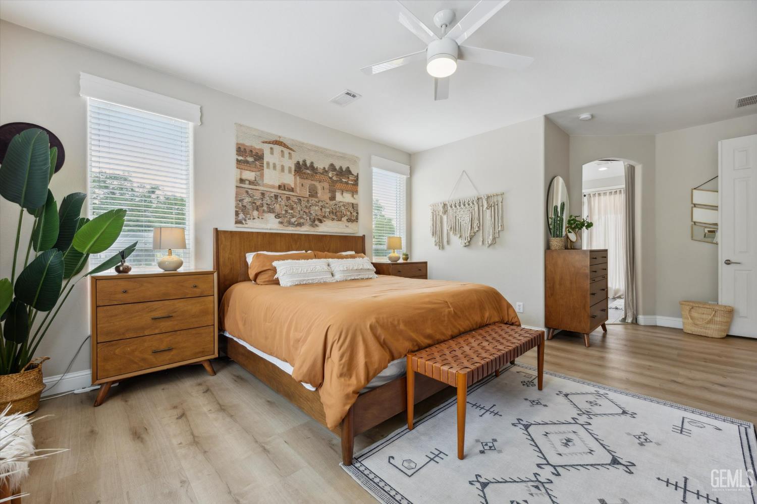 Undisclosed Address Keene, CA 93531 - Photo 26 of 60 a bedroom with a bed and a painting on the wall