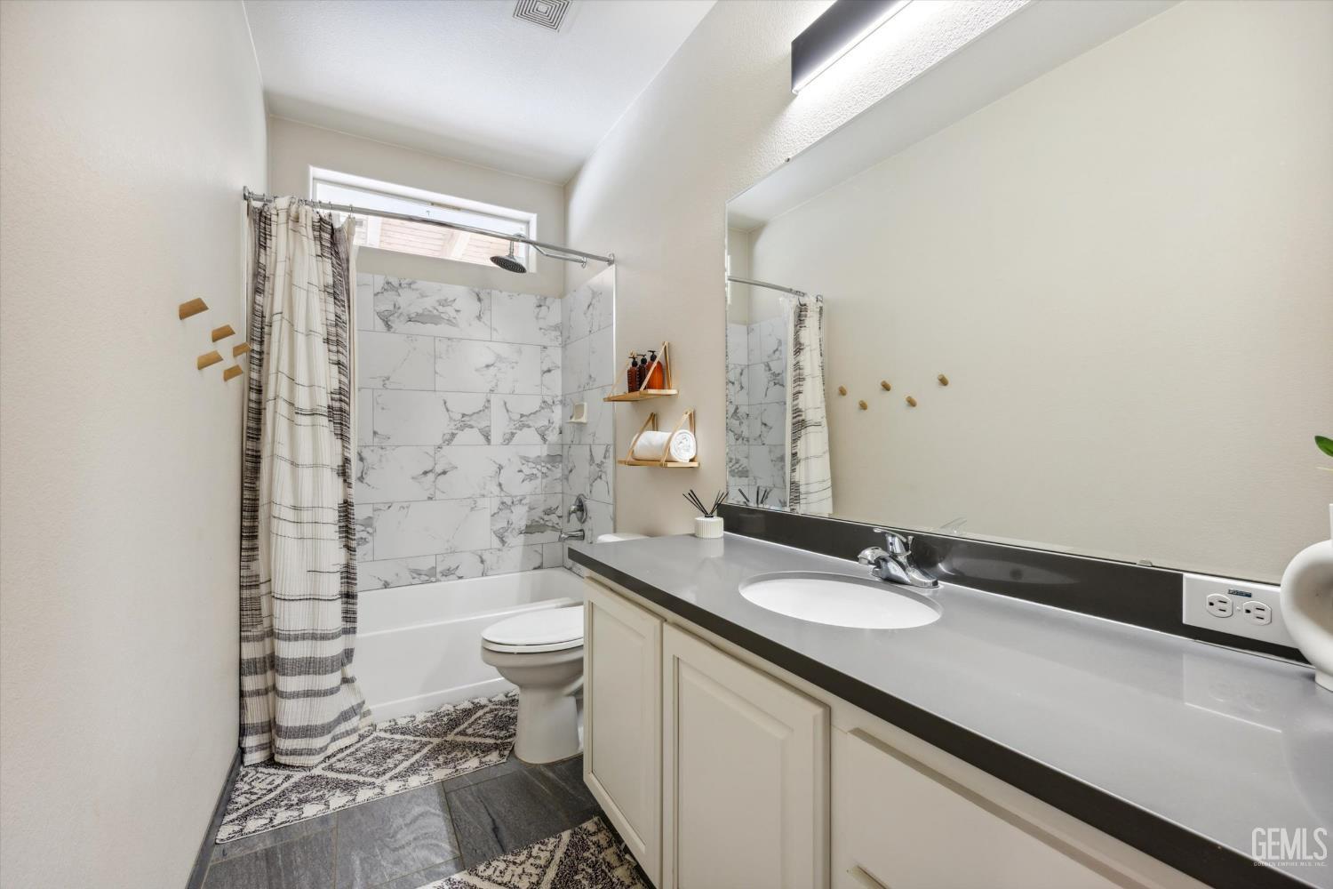 Undisclosed Address Keene, CA 93531 - Photo 33 of 60 a bathroom with a sink a toilet a shower and a mirror