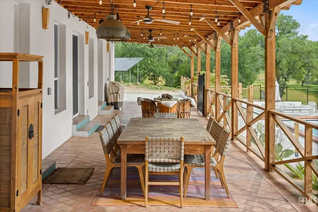 a view of a swimming pool with a patio