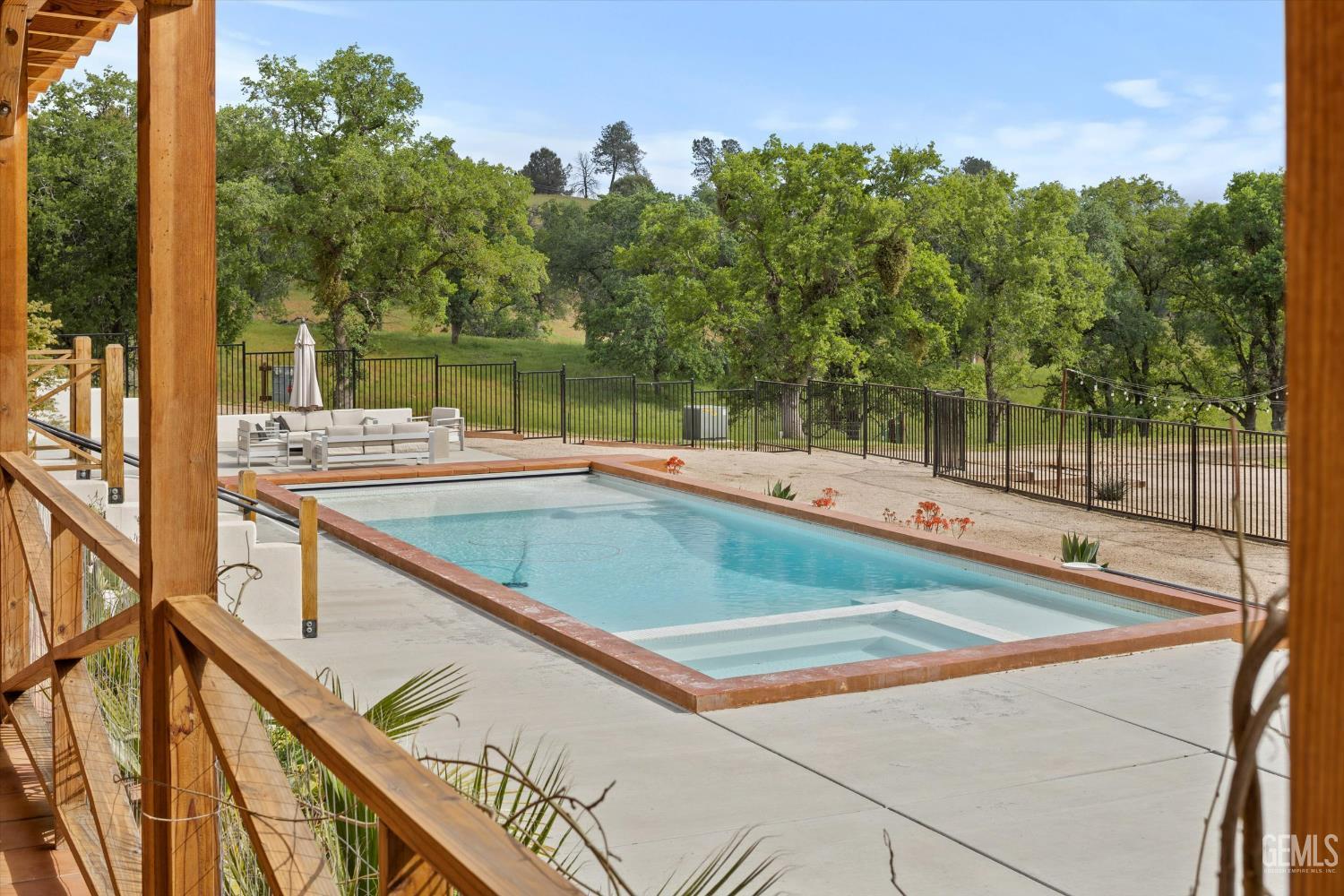 Undisclosed Address Keene, CA 93531 - Photo 41 of 60 a view of a swimming pool with a patio